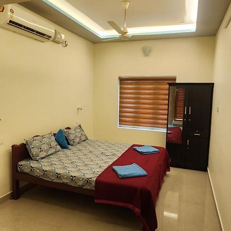 Punerjeni Homes Alappuzha Екстериор снимка